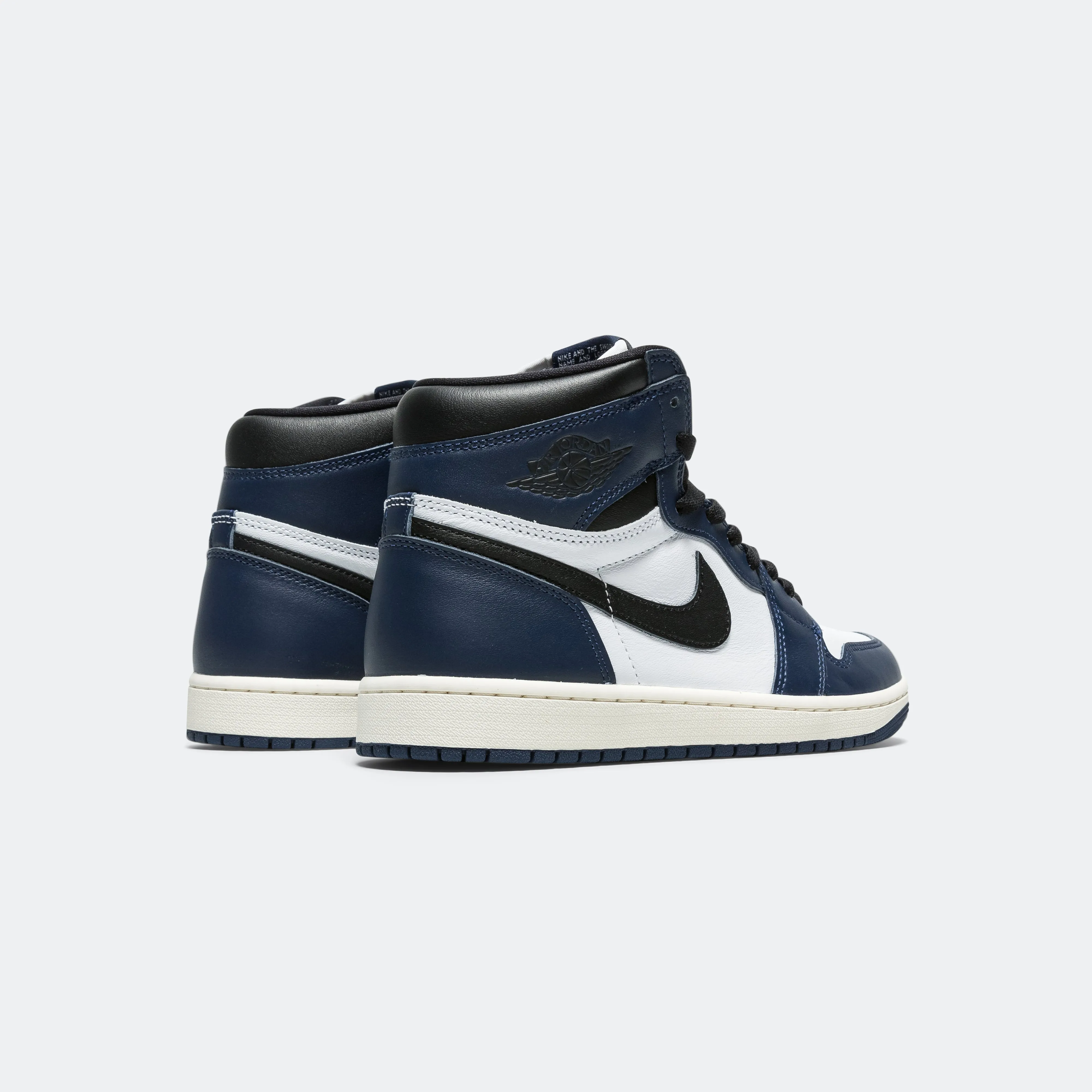 Air Jordan 1 Retro High OG (GS) - Midnight Navy/Black-White-Sail Stable Landing Heel Balance