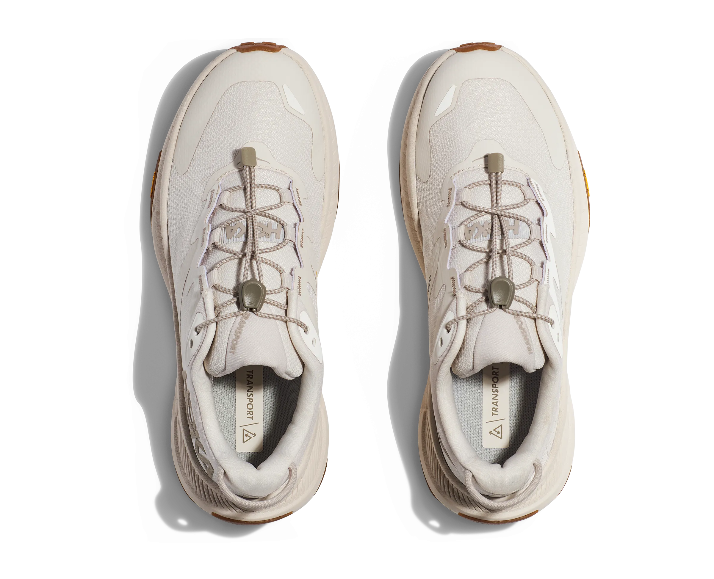 HOKA TRANSPORT EGGNOG WOMEN Comfort Wrap running with a group