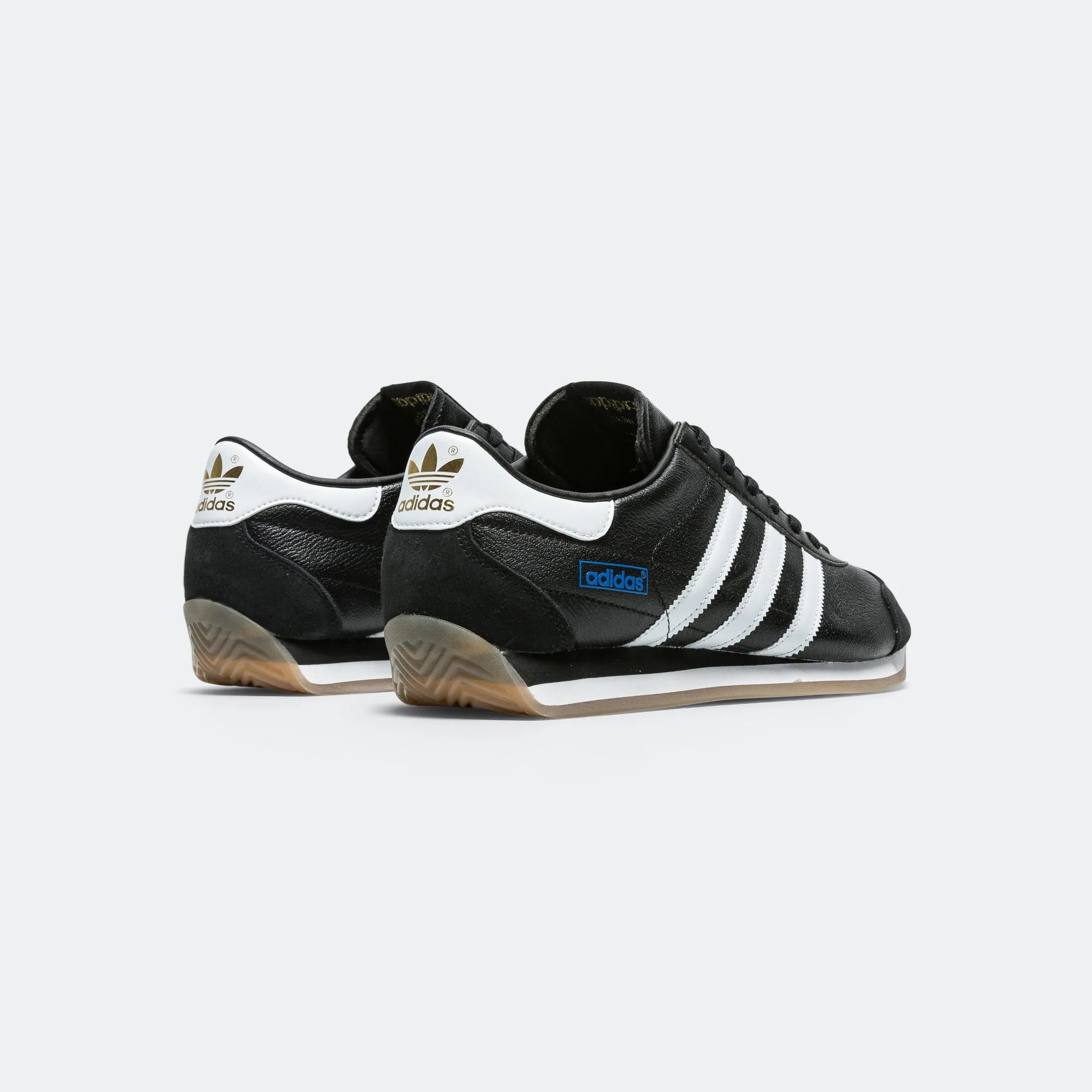 Country Japan - Core Black/Footwear White-Blue Balanced Stack Height