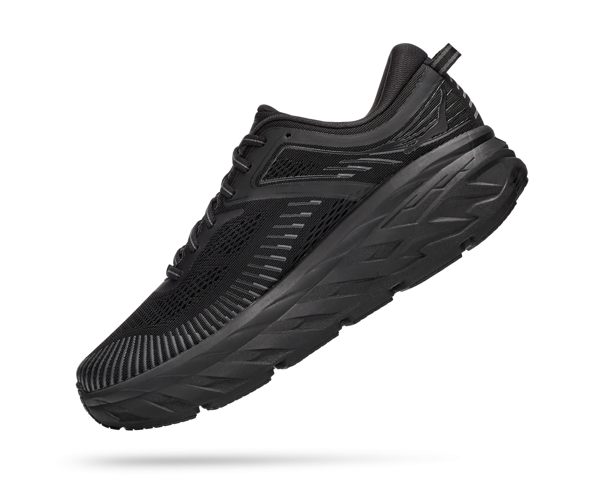 HOKA BONDI V7 WOMEN'S WIDE running in a historic bridge area shoes