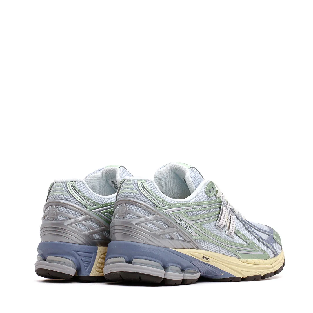 New Balance Men 1906R Ice Blue Melon Water U1906RNE running on dirt shoes