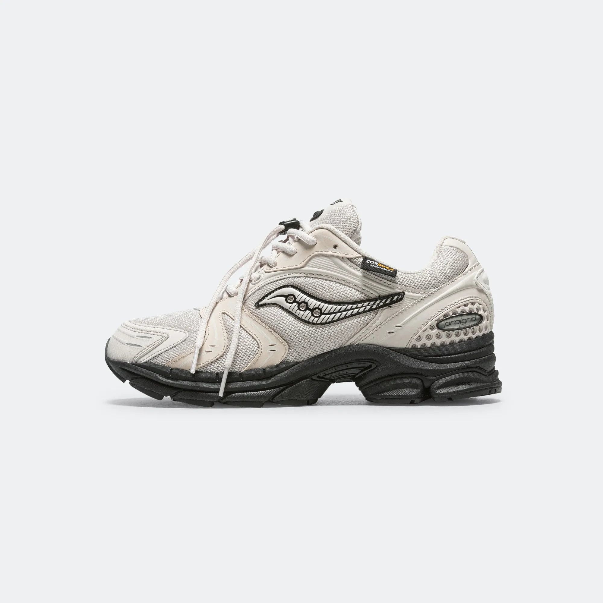 Progrid Triumph 4 - White/Sand Shock Diffusion Technology