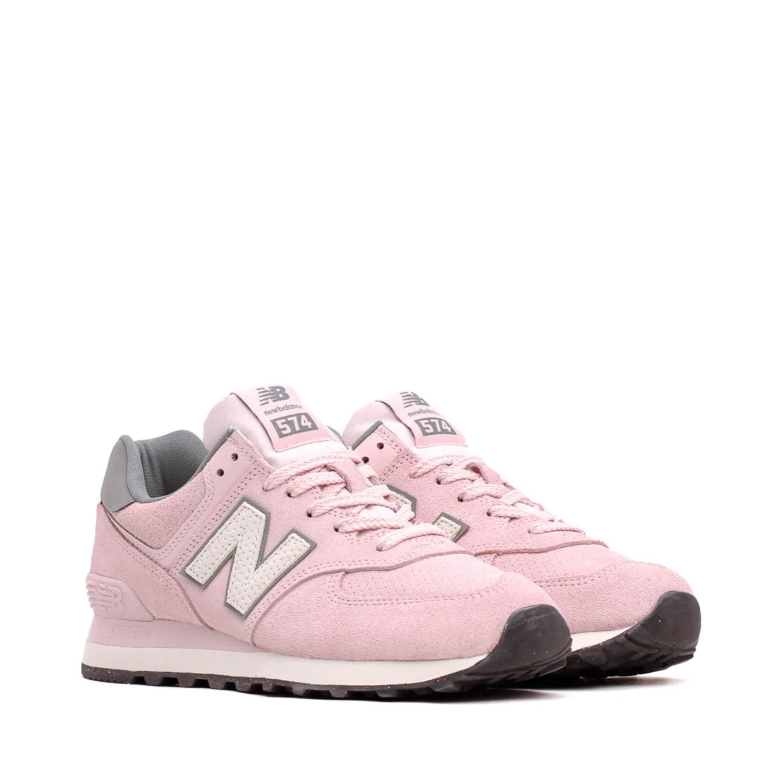 hilly - terrain - runner running in an intersection area shoes New Balance Women 574 Rose Sugar Sea Salt WL574TNP