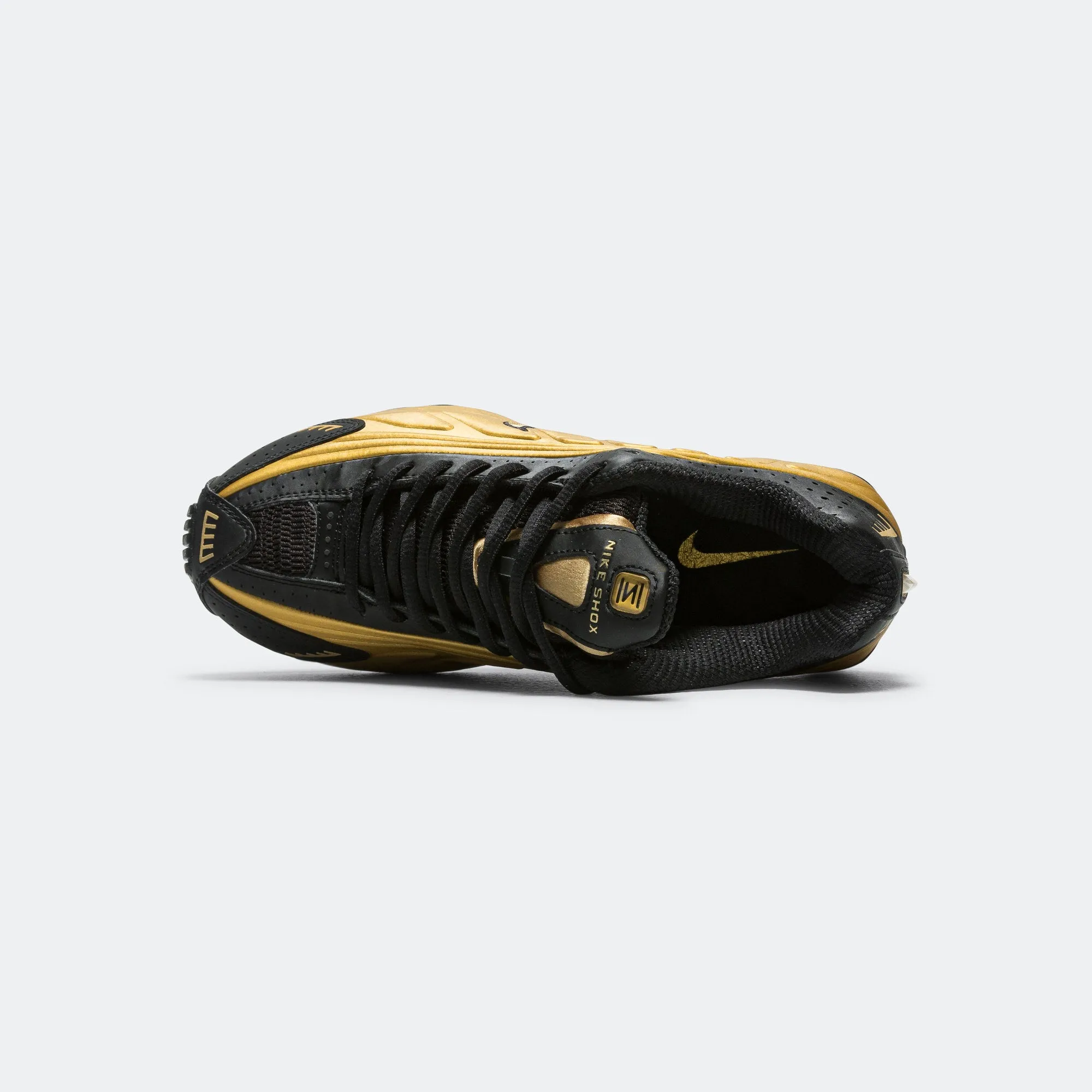 Womens Shox R4 - Black/Metallic Gold-Metallic Silver Rockered Outsole Design Woven Texture