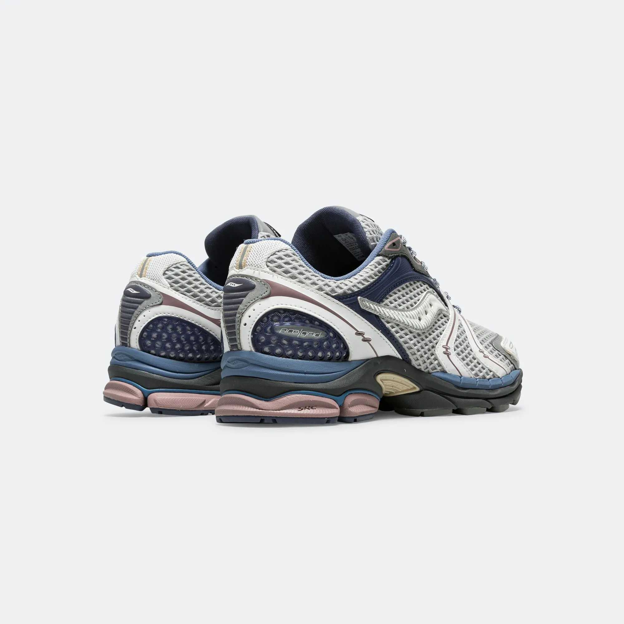 Progrid Triumph 4 - White/Blue Micro Perforated Tongue flex design