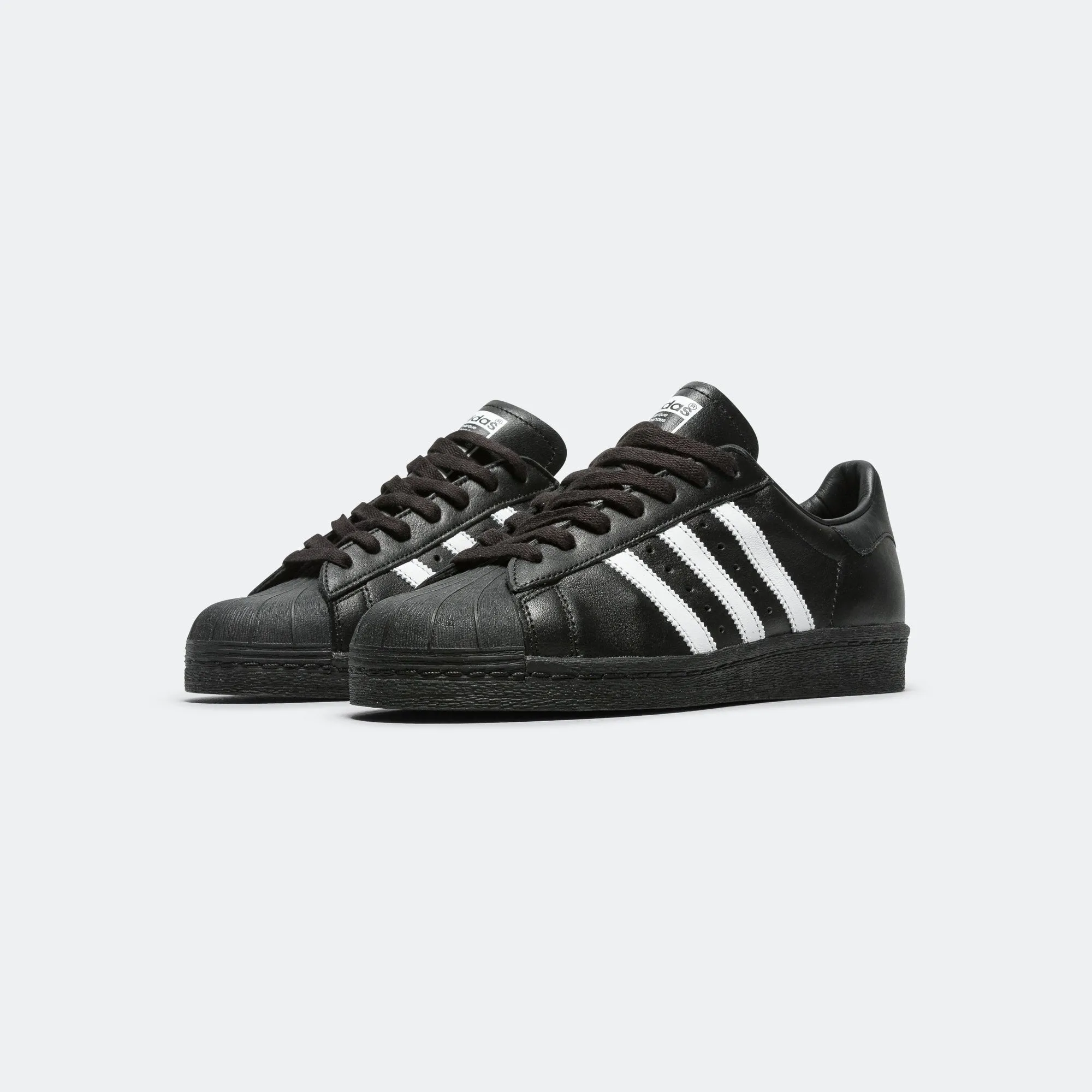 Superstar 82 - Core Black/Footwear White All Day Comfort Engineering Speed Step