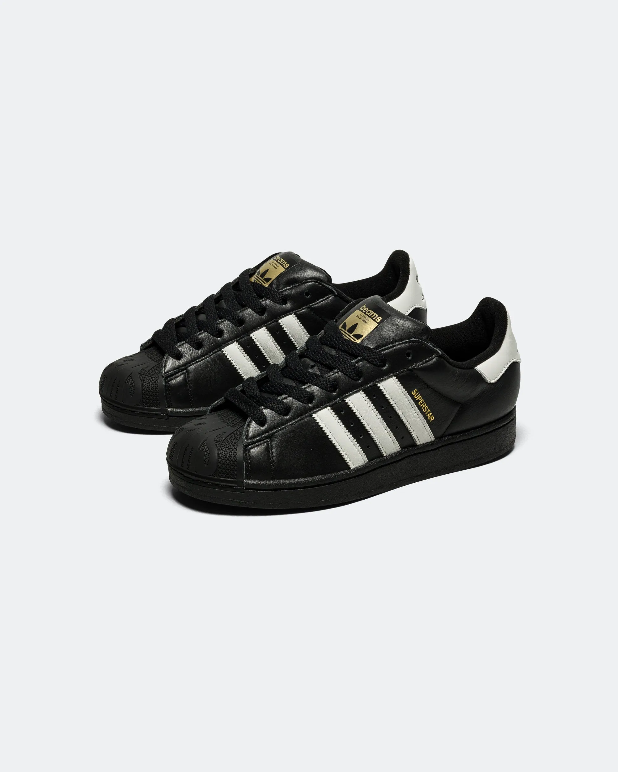 Superstar x BEAMS - Core Black/Footwear White-Gold Metallic Stay Dry
