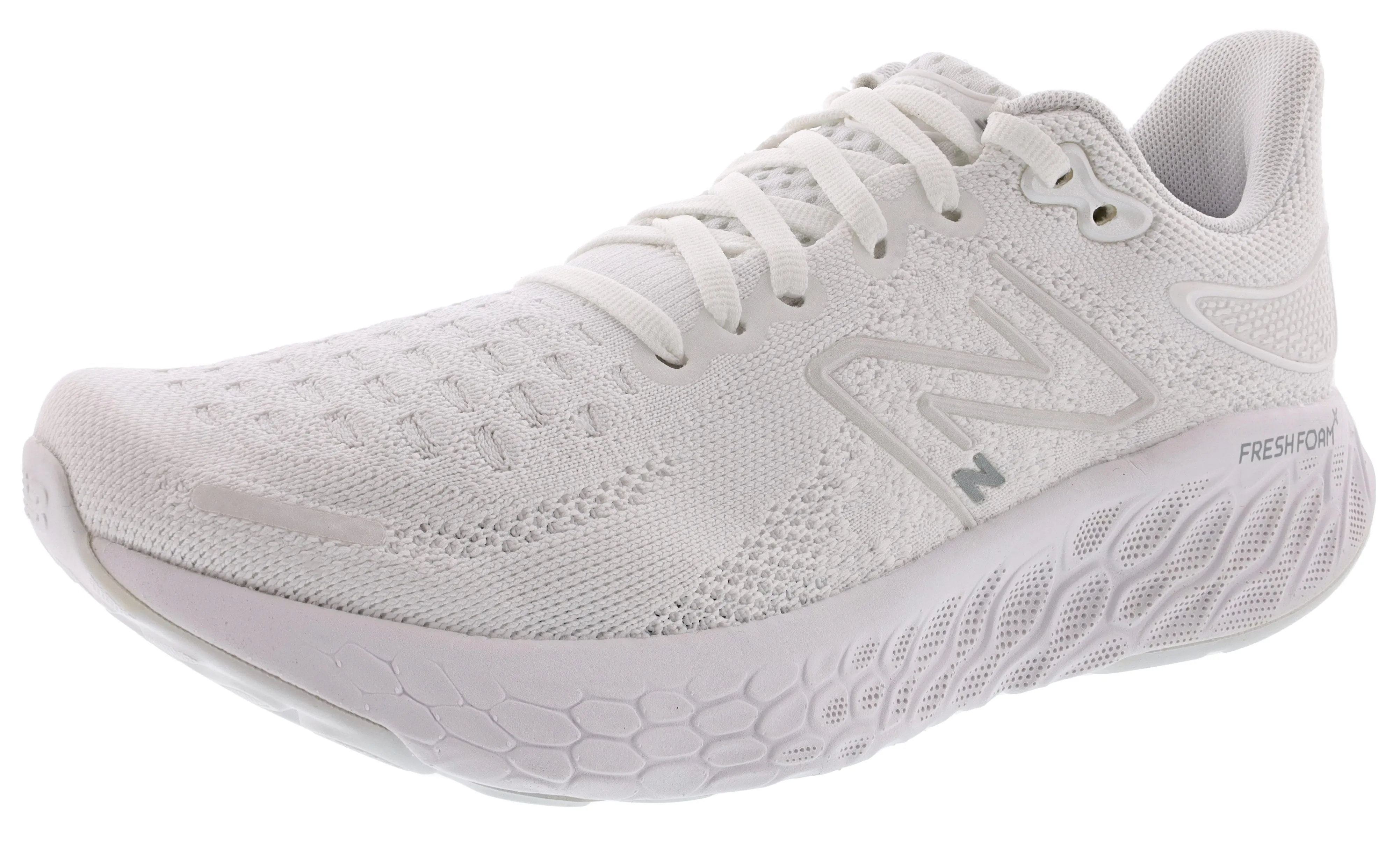 New Balance Women's Fresh Foam 1080 v12 Cushioning Running Shoes running on uneven ground