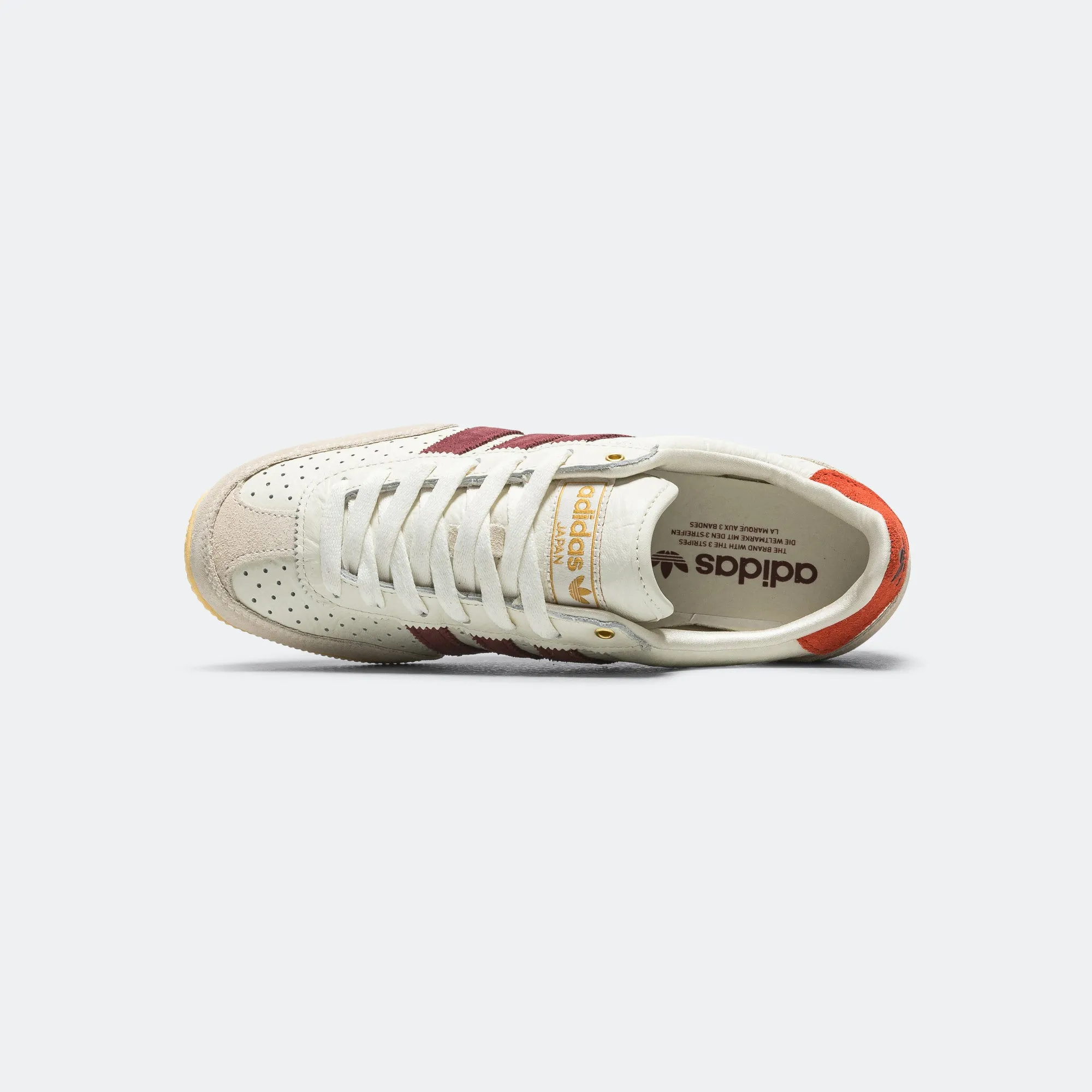 Womens Japan - Off White/Shadow Red-Orange Tint Flexible structure smooth zipper